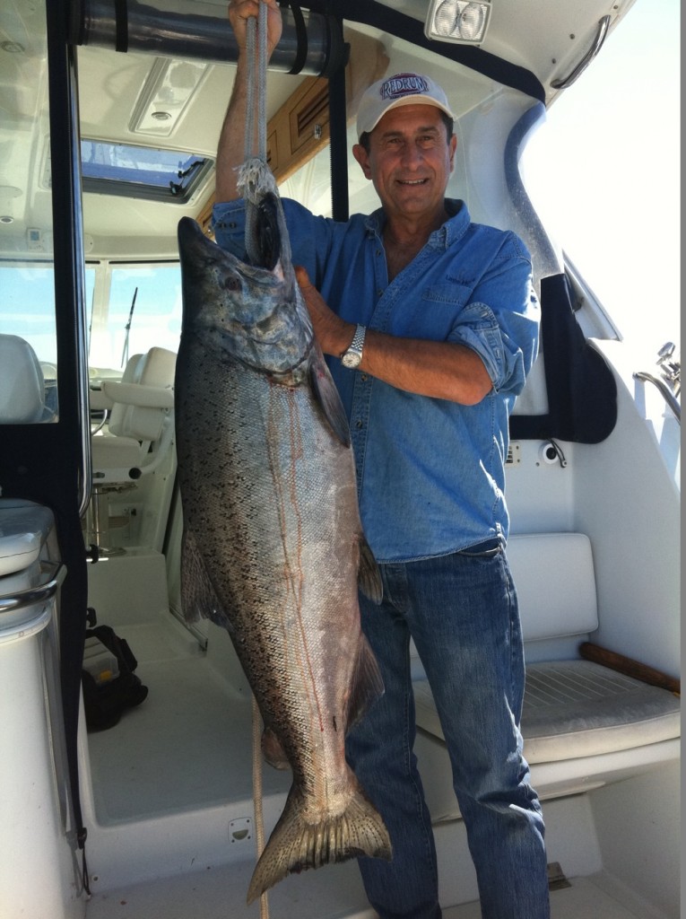 Victor Gonella, Founder and Treasurer of the Golden Gate Salmon Association (GGSA), shows off a huge Chinook salmon that he landed while trolling off Bodega Bay.