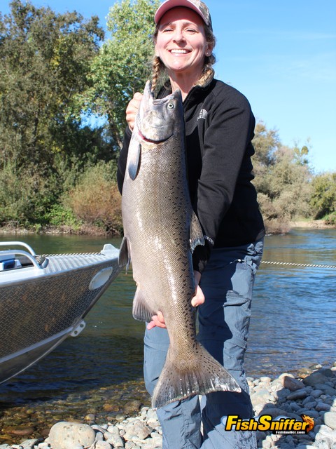 Regina Bosshard had her hands full battling this big, bold salmon on the Feather River in Oroville.