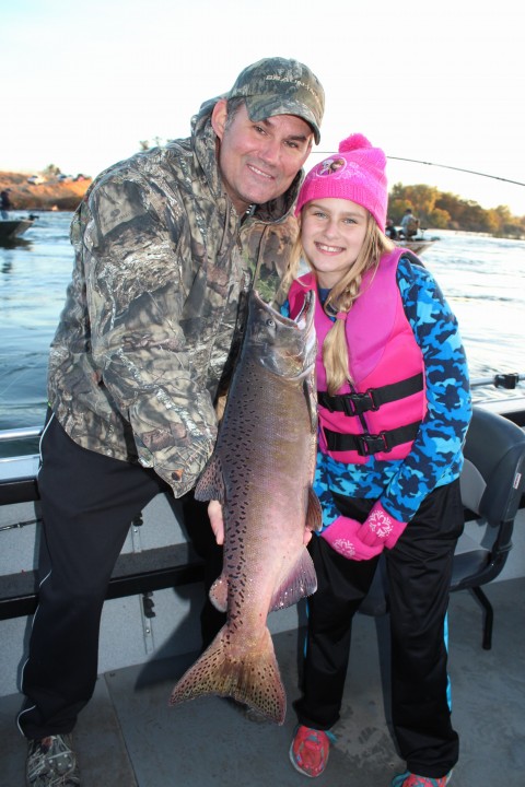  Jeff Bosshard and his daughter, Vivica, pose proudly with the king salmon that she caught while fishing the Feather River below the Thermalito Afterbay Outlet with Robert Weese of Northern California Guide Service on October 6, 2016.