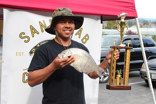 Ken Lagudas of Salinas won first place in the men’s barred surfperch division of the Sand Crab Classic with this 3.14 lb. fish caught while fishing a bloodworm at the mouth of the Salinas River on March 11.